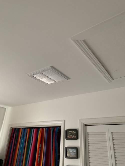 Ceiling supply vent in a bedroom