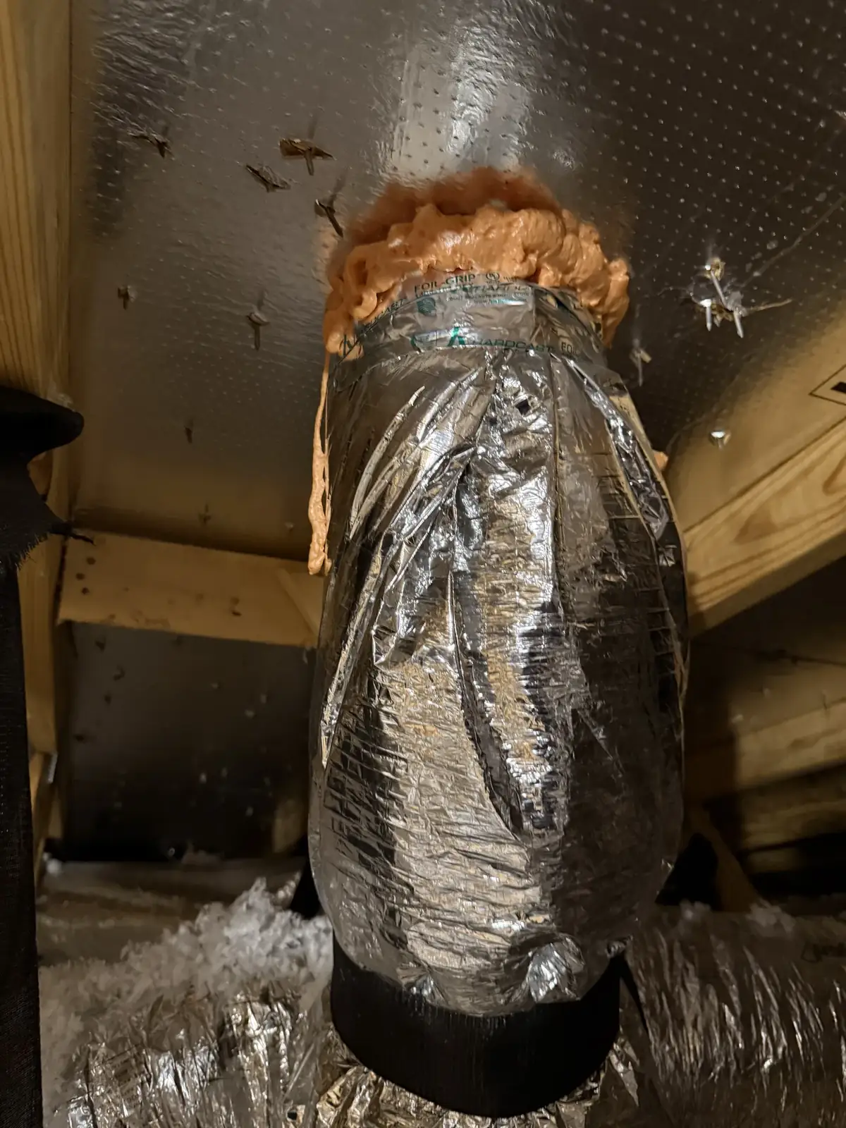 A fresh air intake tied straight to the return with no ERV in a coastal home